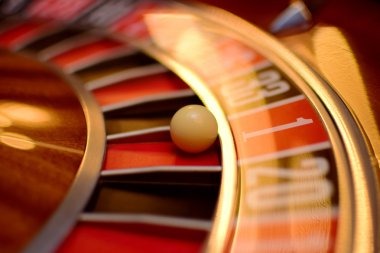 Caishen Wins slot game interface on lobi showing reel grid, stake controls, balance display, and bonus feature indicators